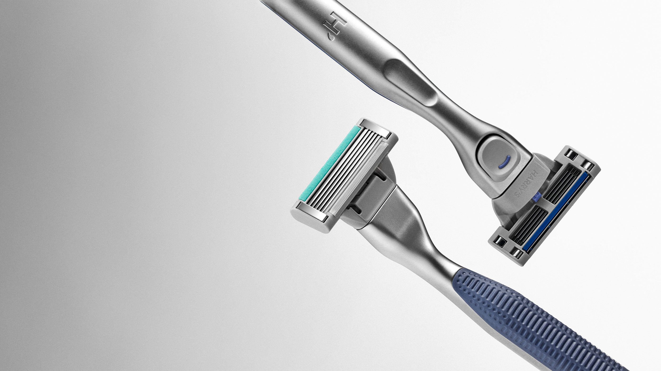 Two Harry's Plus Razors on Grey gradient background